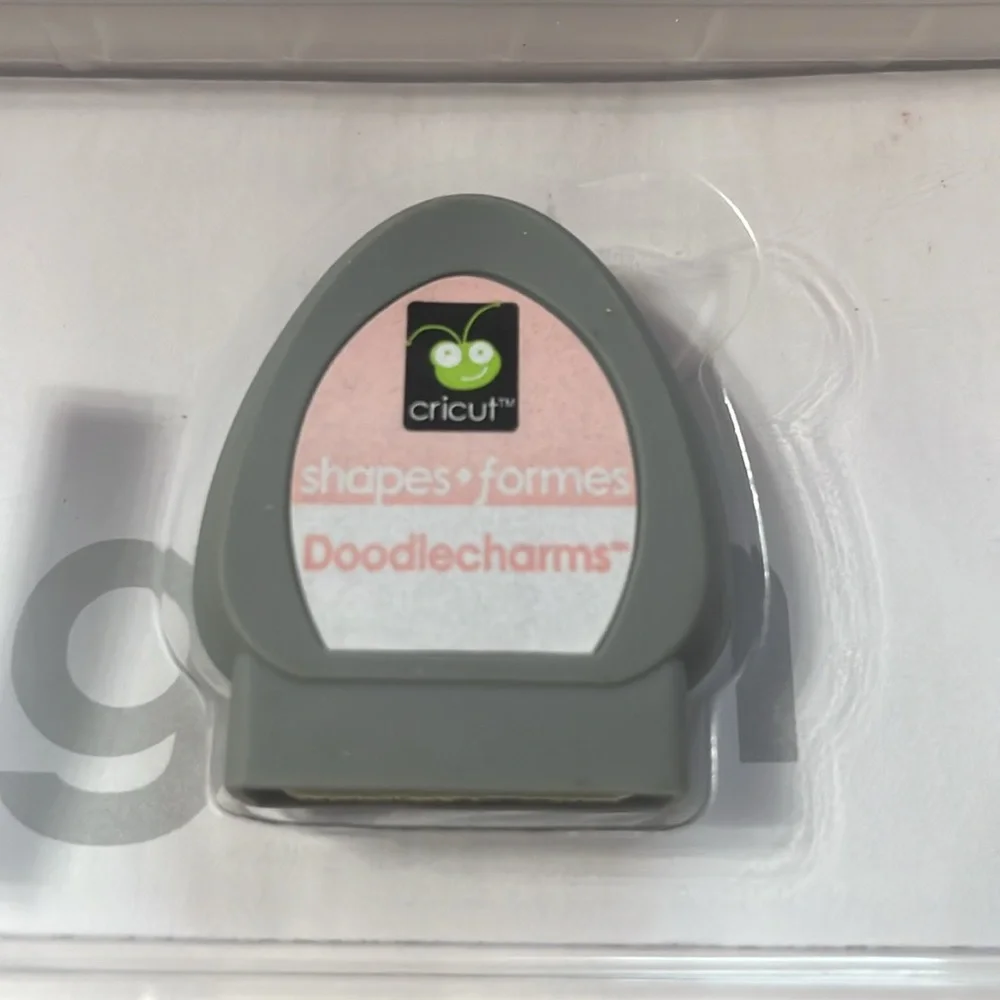 Cricut cartridge. Doodlecharms. Linked